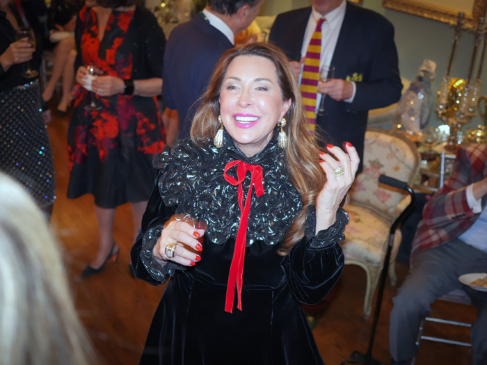 Ann Van Ness greeting guests in her UES townhouse.