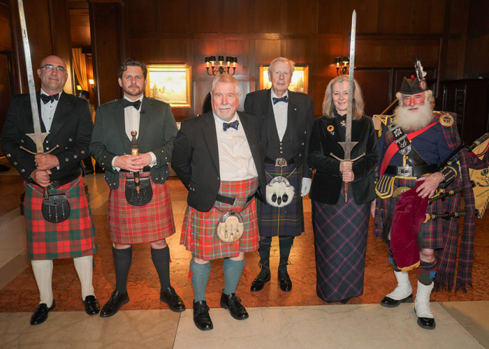 The Haggis Presentation David Blankley, Robert Munro, John AD “Sandy” Needham, Peter Lawrie, Heather Bain, and Pipe Major Jonathan Henken